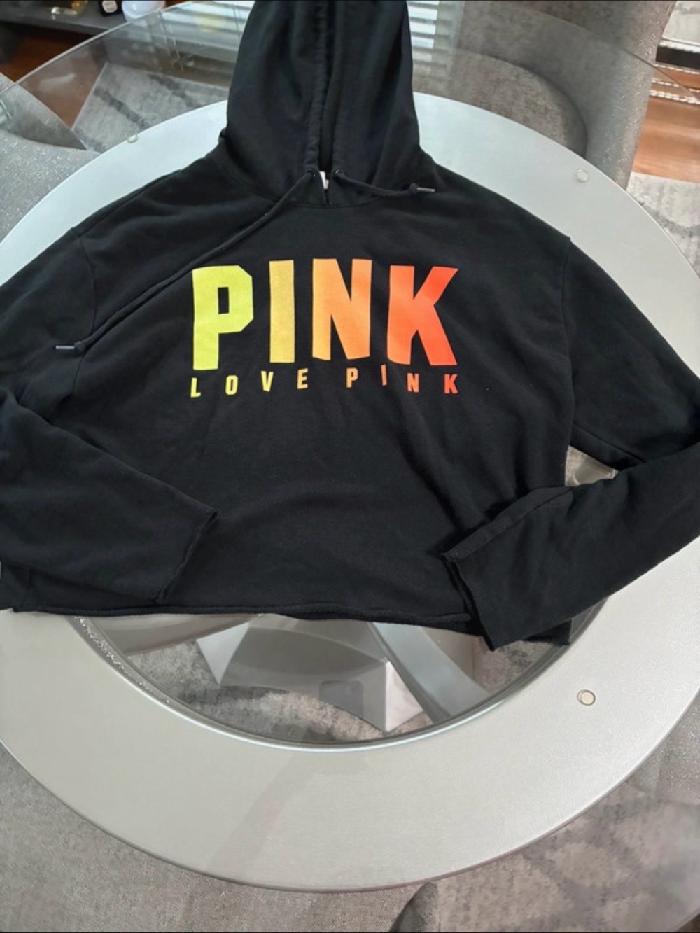 PINK Victoria's Secret Black Cropped Hoodie with Yellow-Orange Gradient Logo